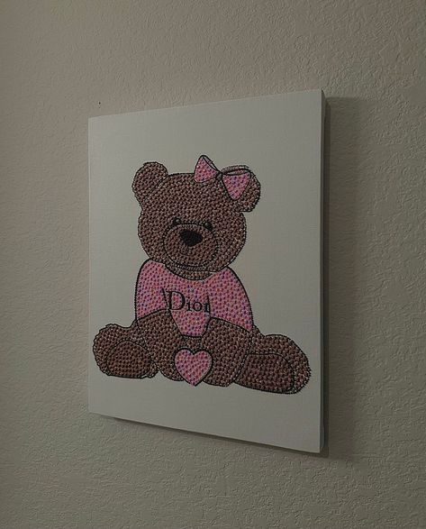 Dior teddy bear reinstone canvas, lots of hours of love went into beading this🫶 Rinestine Art, Teddy Bear Painting Canvas, Bedazzled Wall Art Ideas, Dior Teddy Bear, Badazzel Canvas, Rhinestone Wall Art, Rhinestone Painting Canvas, Bead Canvas Art, Bedazzle Art