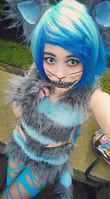 Pin for Later: 77 Drop-Dead-Gorgeous Halloween Costumes For Rainbow Hair Colors Blue Hair Cheshire Cat Hair Colors Blue, Chesire Cat Costume, Rainbow Hair Colors, Hair Color Grey Silver, Cheshire Cat Costume, Rainbow Halloween, Honey Hair Color, The Best Halloween Costumes, Rainbow Hair Color