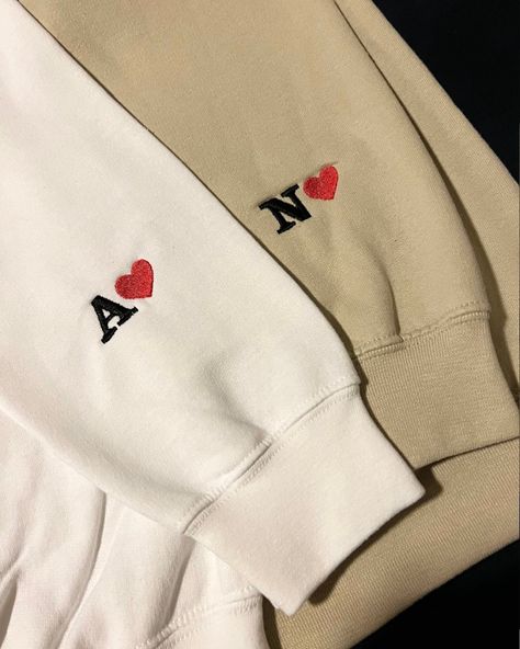 Best gift idea for your love,hand embroidery 🧵 Dm for enquiry All size available Custom Embroidered Initial Heart Sweatshirt, Initial Hoodie Sleeve, Embroidered Sleeve Sweatshirt, Embroidery Personalized Gifts, Sweatshirt Sleeve Embroidery, Anniversary Gifts For Her Romantic, Sleeve Embroidery Designs, Embroidery Designs Sweatshirt, Couple Gifts Ideas