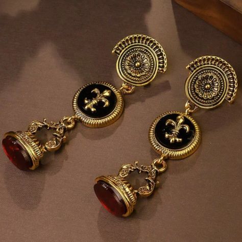 "Viena" Statement Earrings. Fleur De Lis Emblem. Colors: Gold, Black, And Deep Red. Luxe Gold Plated. Royal French Style. Baroque Jewelry, African Inspired Jewelry, Dope Jewelry Accessories, Historical Jewellery, French Jewelry, Goth Jewelry, Jewelry Accessories Ideas, Italian Jewelry, Dope Jewelry