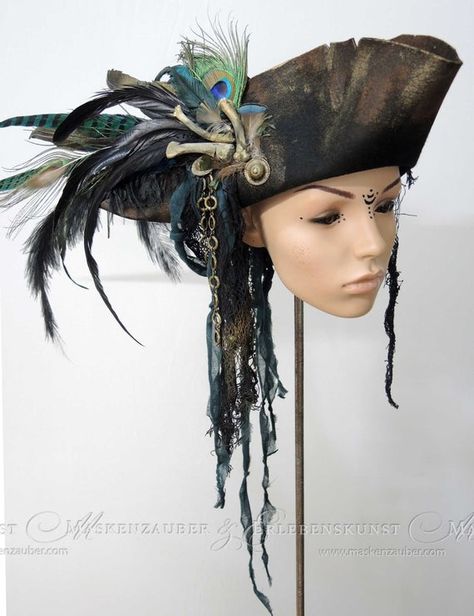 + + + Piracy Hat + + + The pirate-hat is made of aged premium woolfelt. It is adorned with bones, various feathers, chains, buttons and textile materials. The hat is available in sizes between: 54 & 64 Size -> Circumference of your head in cm + + + + + + +++ Pirate Hat +++ The daring Pirate Hat With Feathers, Big Pirate Hat, Authentic Pirate Hat, Pirate Hats Diy, Diy Captain Hook Hat, Pirate Hat Design, Decorated Pirate Hat, Pirate Hat Women, Pirate Hat Aesthetic