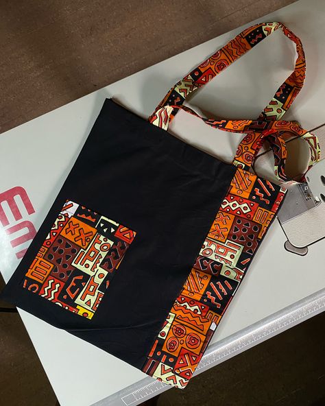 Afrocentric tote bag design made for a customer Price N4500 #totebag #totesteeshub #weddingsouvenirnigeria #topqualitytotebags #totebagsinabuja #madeinabuja #brandsouvenir #brandedtote #weddinggiftitems #weddingsouvenirs #weddingtotebagdesigns #totebags #totebagsforstudent Ankara Tote Bag, Jute Bags Design, Bags Inspiration, Ankara Bags, Bags Patterns, Bags Sewing, African Bag, African Accessories, Bags Diy