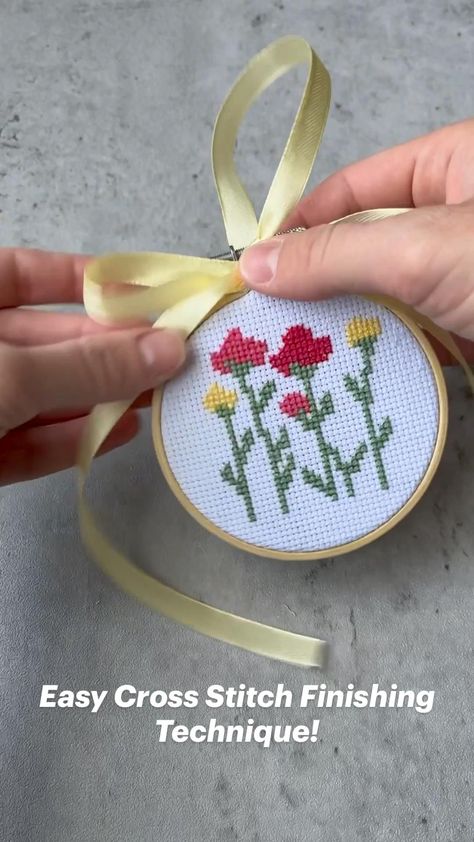 Easy Cross Stitch Finishing Technique! | Cross stitch, Simple cross stitch, Cross stitch flowers . #Cross_Stitch #Cross_Stitch_Hoop #Finished_Cross_Stitch #Easy_Cross_Stitch Hanging Cross Stitch, Cross Stitch With Buttons, 20x20 Cross Stitch Pattern, Embroidery Hoop Finishing Ideas, Cross Stitch Items To Sell, Diy Cross Stitch Christmas Ornaments, Shitts Creek Cross Stitch, Cross Stitch On Fabric, Crossstich Pattern Flowers Free