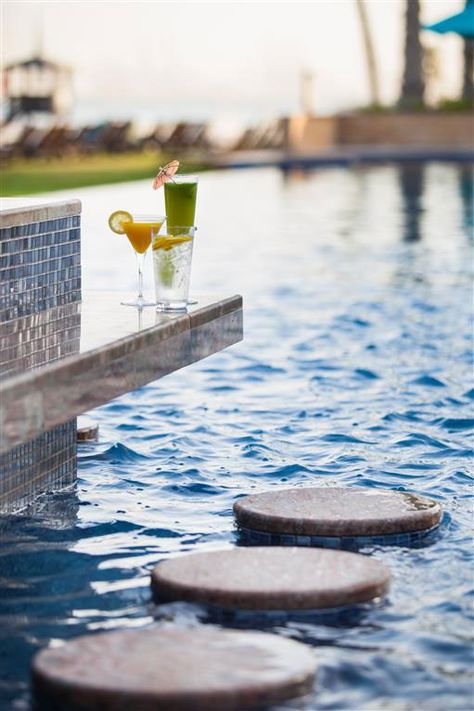 Swim-up bar at JA Palm Tree Court, Dubai.   Is there anything better than not having to leave the pool when you feel like something to drink or eat? Bar Near Pool, Swimming Pool Bar Design, Pool Bar Aesthetic, Bar In Pool, Hotel Pool Aesthetic, Hotel Pool Bar, Resort Pool Bar, Swim Up Bar Pool, Swim Up Pool Bar