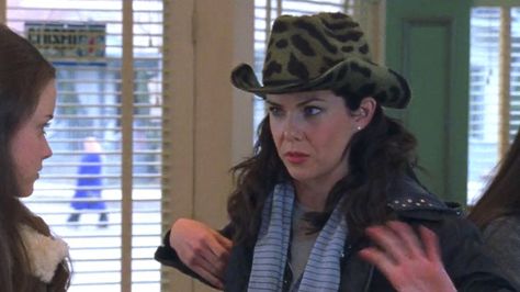 Sorry, still not done talking about hats. Here's a particularly glorious one, paired with Lorelai's favorite accessory: the functionless scarf. Lorelai Gilmore Cowboy Boots, Tiny Scarf, Gilmore Girls Jess, Lorelei Gilmore, Gilmore Girls Outfits, Cher Horowitz, Blue Puffer Jacket, Lauren Graham, Lorelai Gilmore