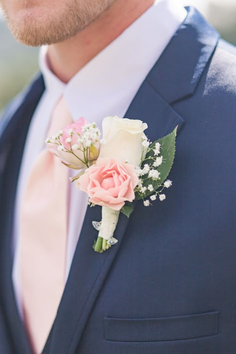 Navy Blue Groom Suit with Blush Tie and Pink and White Rose Boutonniere | Glam Winery Vineyard Wedding in Pilot Hill, CA | Adrienne and Dani Photography | Northern California Weddings | A Glam Winery Vineyard Wedding  at the Hart 2 Hart Vineyards Wedding Venue. Get more inspiration from this Hart 2 Hart Vineyard wedding ceremony and reception. #hart2hartvineyardswedding #weddingphotography #northerncaliforniaweddings Navy Blue Groom Suit, Blue Groom Suit, Navy Blue Groom, Blue Groom, White Rose Boutonniere, Pink Boutonniere, Blue And Blush Wedding, Blush Tie, Vineyard Wedding Venue