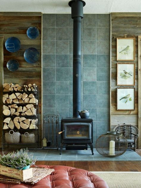 See inside a designer's boho inspired summer retreat on a Canadian lake Tile Wood Burning Stove, Wood Burning Stove Corner, Garage Redesign, Wood Stove Surround, Wood Stove Wall, Foyer Room, Wood Stove Hearth, Wood Burning Stoves Living Room, Stone Hearth