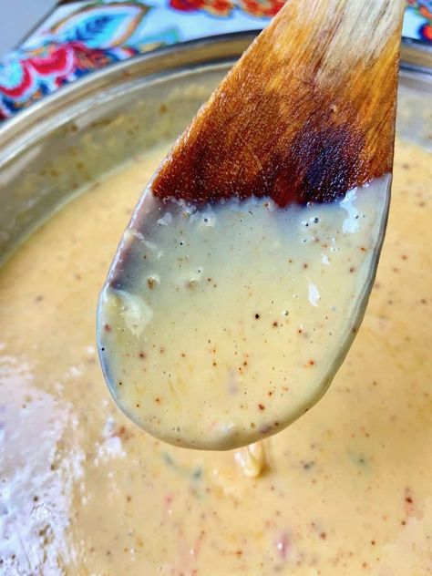 If you've ever traveled to Texas, then you know how much we love our Tex-Mex Chile con Queso! It's the "Liquid Gold of the Lone Star State!" This restaurant-quality recipe is silky, creamy and flavorful - made with a few simple ingredients and it's ready in less than 15 minutes!Recipe at SmartyPantsKitchen.com Chile Con Queso Recipe, Chuy’s Queso Recipe, Chuys Queso Recipe Copycat, Alamo Cafe Queso Recipe, Chuys Queso, Chuys Queso Recipe, Texas Queso Dip, Cafe Appetizers, Tex Mex Queso