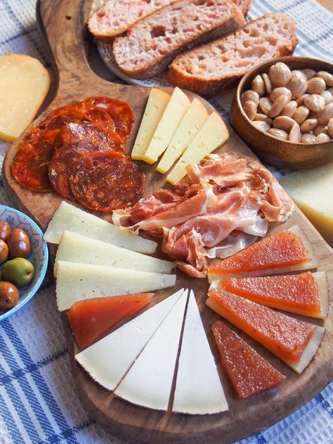 A Spanish cheese board, with or without cured meats as well, is a great way to start a meal or for a light lunch. Get tips on what to include. Gourmet Cheese Board, Spanish Tapas Dinner Party, Spanish Cheese Board, Spanish Tapas Board, Spanish Night Party, Spanish Charcuterie Board, Spanish Food Aethstetic, Spanish Party Aesthetic, Spanish Christmas Food