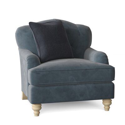 A button-tufted back and turned feet let this armchair fit right in with traditional and farmhouse rooms alike. It's crafted with a solid birch wood frame in a soft silhouette with recessed arms and an arched back. Sinuous springs in its seat provide just the right amount of give that bounces back when you get up. This chair comes in plenty of different fabrics and colors, so you can find the right one for your well-made living room. Plus, a throw pillow is included for an extra cozy touch. Feat Farmhouse Rooms, Blue Velvet Chairs, Rolled Arm Chair, Throw Pillow Fabric, Blue Armchair, Decorative Light Bulbs, Linen Armchair, Upholstered Armchair, Fabric Armchairs