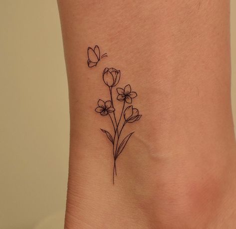 Tattoo Ideas Butterfly Small, Grow Tattoo Words, Tattoo Ideas Simple Flower, Flower Tattoo Ideas Small, Buttercup Tattoo Small, Tiny First Tattoos, Tulip And Daisy Bouquet Tattoo, Small Cute Flower Tattoos, March Tattoo Flower