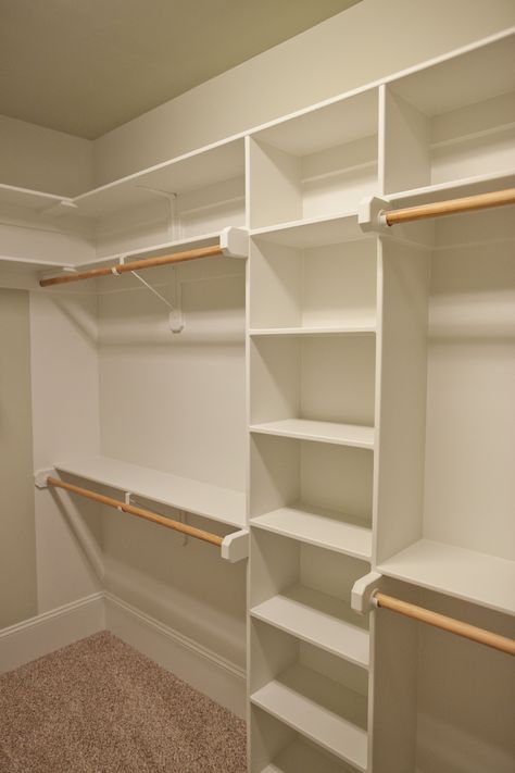 Spacious closet with built in shelves and two levels of hanging space by Lawrence Homes, Inc | Photography by One Studios :: Photography Simple Master Closet Ideas, Masterbed Closet Ideas, Closet With Built In Shelves, Built In Shelves In Closet, Closet Wall Organization, Built Out Closet, Walk In Closet Ideas Diy Cheap, Master Closet Built Ins, Very Small Walk In Closet Ideas