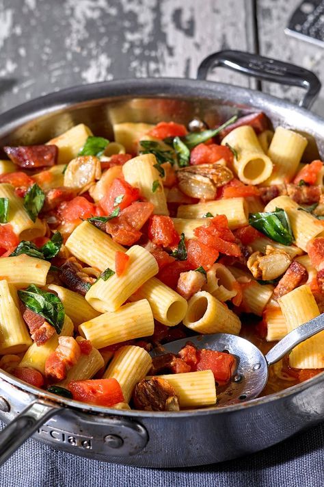 NYT Cooking: This pasta dish, known as maccheroni alla San Giovanniello in Italy, is amazing in the summer months, when there are good fresh tomatoes around. But you can make it any time of year with canned tomatoes. You could also make it with much less prosciutto, really just enough to season the oil — a quarter cup or so. No matter how much you use, start with a hunk o... Pasta With Prosciutto, Prosciutto Pasta, Garlic Recipe, Cherry Tomato Pasta, Nyt Cooking, Garlic Recipes, Tomato Pasta, Big Meals, Chard