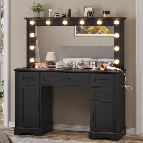 PRICES MAY VARY. 【Various Storage Space】This large makeup vanity boasts of many storage units including 1 bid drawer, 3 smaller ones, 2 different-sized cabinets, 1 of which has adjustable shelf to fit items of different height. 【Large Mirror & 12 Hollywood Lights】This vanity features a large HD mirror and 12 Hollywood lights which provides 3 light settings and different levels of brightness, so you can always find perfect light for your makeup. 【Power Outlet That Frees Up Desktop Space】The vanit Cabinets For Bedroom, Goth Vanity, Black Vanity Desk, Vanity Set Up, Bedroom Vanity Set, Vanity With Mirror, Hollywood Lights, Vanity Benches, Black Vanity