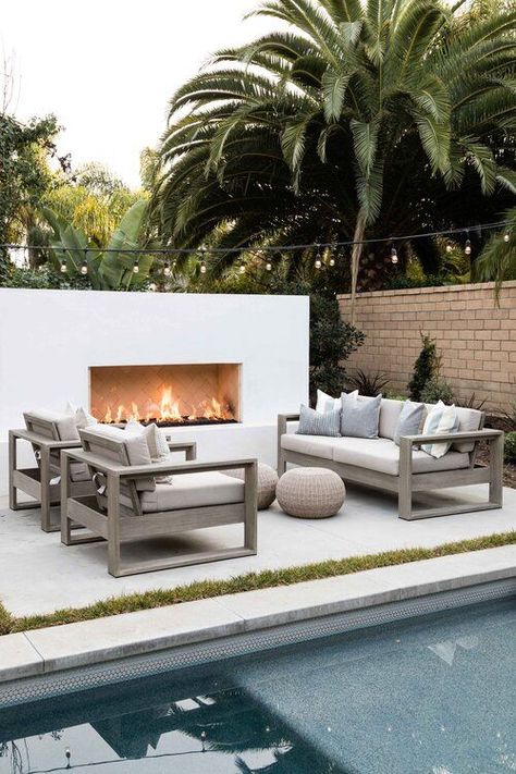 Beautiful backyard patio, swimming pool, outdoor seating area, and fireplace - patio ideas - backyard - outdoor fireplace - fire pit - outdoor furniture Fireplace Patio, Pure Salt Interiors, Outdoor Fireplace Designs, Pure Salt, Balkon Design, Backyard Fireplace, Beautiful Patios, Ideas Backyard, Patio Interior