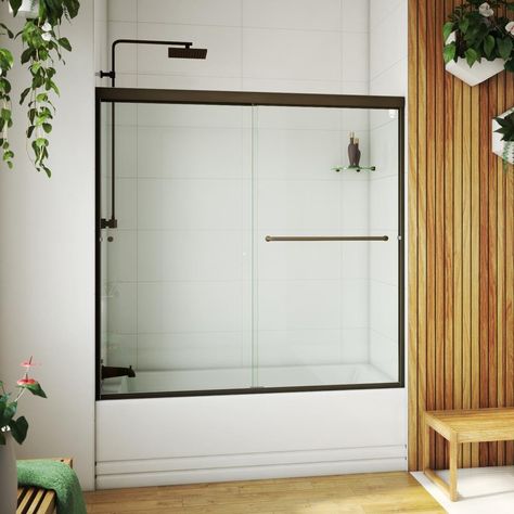 The LETER semi-frameless sliding tub door is made to order and manufactured in the USA. Our LETER has 1/4-in thick tempered glass and provides a luxurious look and feel. The wall jambs allow up to 1/4-in adjustment and can be mounted on any surface. Available in a full range of heights, finishes, and glass options to suit your needs. At Arizona Shower Door, we are just as dedicated to providing you with an exceptional shower enclosure as we are to giving you excellent customer service. With our Black Bathtub, Tub Door, Tub Enclosures, Bathtub Doors, Tub Doors, Bathroom Tub, Frameless Shower, Tub Shower Combo, Upstairs Bathrooms