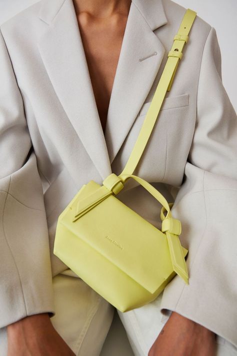 Acne Studios’ Musubi Bag Is Getting An Update Featuring One Of Spring’s Biggest Color Trends Neon Bag, Cheap Purses, Fall Handbags, Popular Handbags, Yellow Handbag, Spinner Luggage, Bag Sewing, Cute Handbags, Handbags Affordable