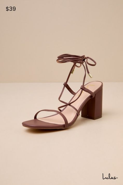 The Lulus Aribaa Brown Lace-Up High Heel Sandals will be your new fave shoes that give any look the perfect finishing touch! Smooth vegan leather shapes these chic heels featuring a slender toe band and matching laces (with gold aglets) that crisscross at the vamp before wrapping and securing at the ankle. 3. 5" block heel. Cushioned insole. Rubber sole has nonskid markings. All vegan friendly, All man-made materials. Imported. Lulus | Aribaa Brown Lace-Up High Heel Sandal Heels | Vegan Friendly Brown Block Heel Sandals, Lace Up Block Heel, Lace Up High Heels, Chic Heels, Sandal Heels, Heel Sandal, Heel Sandals, High Heel Sandals, Vegan Friendly