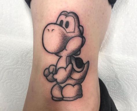 Yoshi Tattoo Black And White, Yoshi Tattoo, Games Characters, Movie Tattoos, Tattoo Videos, Star Tattoos, Tattoo Idea, Black Tattoos, Cute Tattoos