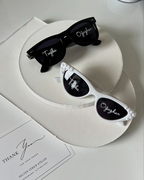 Tuğba & Oğuzhan 🤍 ✨ **Personalized Sunglasses Set** ✨ Make your special moments even brighter with our custom-made sunglasses! Whether it’s a wedding, bachelorette party, or any occasion, add a unique touch with these personalized designs. 🕶️✨ 🔹 **Classic Black for Groom** - A sleek, timeless look with custom engraving. 🔹 **Glamorous White for Bride** - Elegant white frames embellished with pearls for a chic, luxurious feel. These handmade sunglasses are perfect for couples who want to s... Bride Sunglasses Wedding, Groom Sunglasses, Bride Sunglasses, Bride Elegant, Wedding Sunglasses, Personalized Sunglasses, Handmade Sunglasses, Wedding Bachelorette Party, White Frames