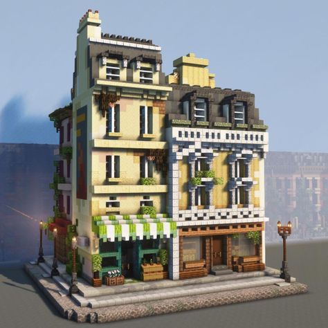 Blaze on Instagram: “Today’s post is a Paris street corner. . It features 4 buildings, a lamppost, awnings, chimneys, a flower stand, 2 posters, ivy, dormers…” Cottage Town Minecraft, Minecraft Modern Townhouse, Townhouse Minecraft Ideas, Minecraft City House Ideas, Minecraft French Building, Minecraft Urban Houses, Town Houses Minecraft, Minecraft Houses City, Minecraft Corner Store