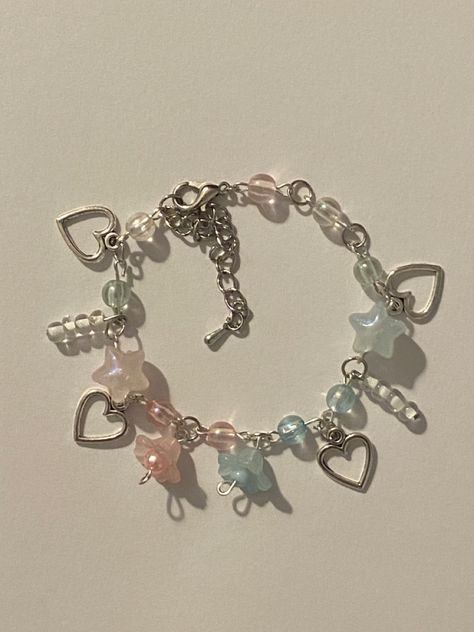 #bracelet#stars#heart#charm#charms#flower#pink#blue#pinkstars#bluestars Pink And Blue Bracelets, Y2k Bracelets, Pink Charm Bracelet, Star Charm Bracelet, Diy Jewelry Charms, Pink Beaded Bracelets, Bracelet With Charms, Bracelet Inspo, Bracelet Heart