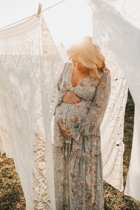 Floral Maternity Dress Photoshoot, Mini Maternity Shoot, Floral Dress Maternity Shoot, Clothes Line Photoshoot Maternity, Farmhouse Maternity Shoot, Maternity Clothesline Photoshoot, Maternity Photography White Sheet, Maternity Sheet Photography, Maternity White Sheet Photoshoot