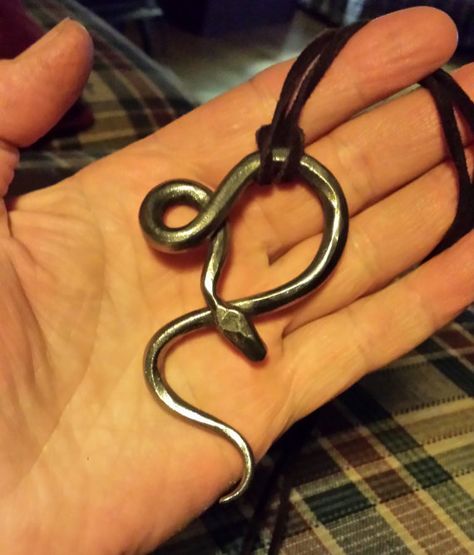 Forged with hammer and anvil from mild steel this snake has a nice look. Serpent Necklace, Iron Jewelry, Blacksmith Projects, Iron Ring, Forging Metal, Snake Pendant, Snake Jewelry, Magical Jewelry, Handmade Wire Jewelry