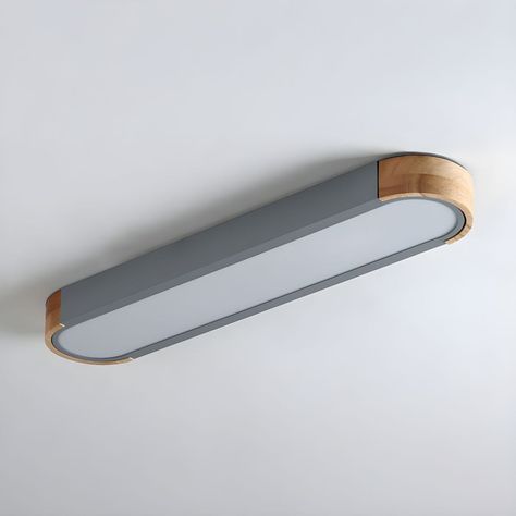 Modern in design, this LED-light flush mount lighting features rounded wood accents along its elongated frame. Emitting a warm 3000K light, it creates a cozy atmosphere in any space. Utilizing an acrylic diffuser, it ensures even distribution of light. With dimensions exceeding 30 inches in width and a slim profile of only 1.57 inches in height, it's tailored for spaces with 8-foot or lower ceilings, including closets, hallways, bedrooms, and bathrooms. Additionally, it serves as an ideal kitche Laundry Room Light Fixture, Narrow Hallway Lighting, Mudroom Lighting, Laundry Room Lighting Ideas, Closet Lighting Ideas, Kids Bedroom Lighting, Kids Lighting Bedroom, Hallway Ceiling Lights, Hallway Light Fixtures