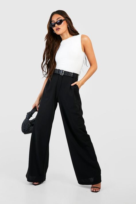 Step out in style with universally flattering wide-leg pants for a trans-seasonal style you'll be wearing 24/7. Featuring a relaxed fit on the legs, these wide-leg pants sit high on the waist, offering an exaggerated leg that frames your figure by lengthening the legs and accentuating the waistline. Widening at the waist or hips and remaining the same width to the hem, these women's wide-leg pants create an incredibly flattering silhouette on every body shape, so trust us when we say you don't Trousers With Sneakers, Dad Pants, Hen Party Dress, Engagement Party Dresses, Man Pants, Printed Palazzo Pants, Black Tie Dress, Sports Luxe, Black Trousers