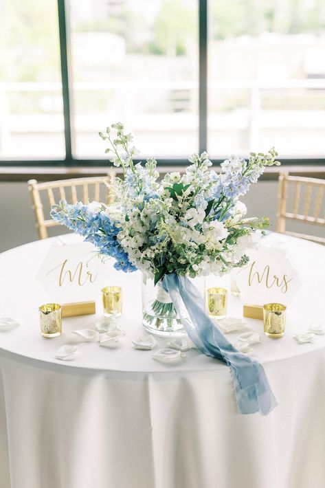 bride's blue and white floral bouquet sits in vase on sweetheart table at the Terrace at Cedar Hill | Uptown Charlotte Wedding at the Terrace at Cedar Hill photographed by NC wedding photographer Kevyn Dixon Photography Sweetheart Table Centerpiece, Sweetheart Table Flowers, Blue Wedding Centerpieces, Sweetheart Table Decor, Head Table Wedding, Sweetheart Table Wedding, Wedding Reception Flowers, Wedding Reception Centerpieces, Blue Themed Wedding