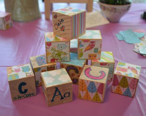 I love these!! Create your own wooden blocks at the baby shower. There is also a wooden letter as the guest book that is awesome too! Baby Shower Activities For Guests, Wooden Baby Blocks, Baby Blocks Baby Shower, Baby Shower Table Centerpieces, Ideas For Baby Shower, Shower Activities, Baby Decor Diy, Ideas Baby Shower, Baby Shower Crafts