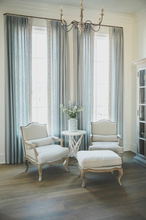 Classic French Bergere arm chairs and pale blue drapes in a French country room by Brit Jones with Sherwin Williams Alabaster paint. Light Blue Curtains Bedroom Bed Bath & Beyond, Light Blue Curtains Living Room Bed Bath & Beyond, Curtains For Light Blue Bedding, French Country Decorating Bedroom, Söderhamn Sofa, French Country Decorating Living Room, Sherwin Williams Alabaster, French Country Rug, Country Bedroom Decor