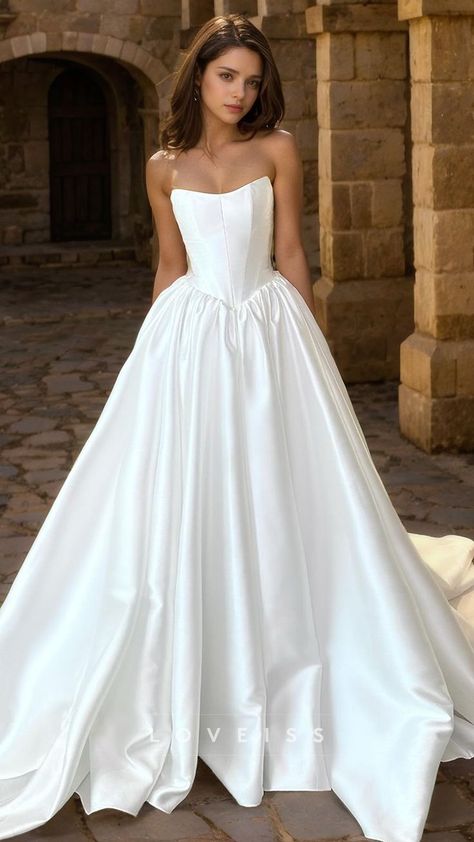 Create an elegant and modern look on your big day with our Sweetheart Sleeveless Pleated Sleek A-Line Wedding Dress. This dress features a flattering sweetheart neckline and a sleek pleated A-line silhouette that will accentuate your figure. The sleeveless design adds a touch of sophistication, making this dress perfect for any bride looking for a modern twist on a classic style. Drop Waist Wedding Dress, Classy Wedding Dress, Pretty Wedding Dresses, Wedding Dress With Pockets, Cute Wedding Dress, Wedding Dress Train, Sweetheart Wedding Dress, Wedding Dresses Corset, Dream Wedding Ideas Dresses