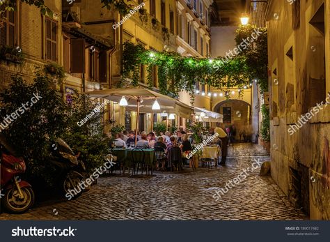 Night view of old cozy street in Trastevere in Rome, Italy. Trastevere is rione of Rome, on the west bank of the Tiber in Rome, Lazio, Italy. Architecture and landmark of RomeTrastevere#Rome#Italy#street Rome At Night, Trastevere Rome, Moving To Italy, Rome Tours, Living In Italy, Piazza Navona, Montepulciano, Old Street, Rome Travel