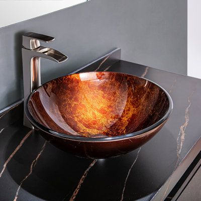 Looking for a circular vessel sink that stands apart from the rest? You’ll find that and more with the series vessel bathroom sinks. This eye-catching sink is crafted from the finest materials to deliver enduring beauty and performance without requiring intensive maintenance. | Vinnova Enna 5.7" Tall Tempered Glass Hand Painted Circular Vessel Bathroom Sink 5.7 H x 16.5 W x 16.5 D in Brown | 16.5" L X 16.5" W X 5.7" H | Wayfair Rectangular Sink Bathroom, Laundry Design, Rustic Bathroom Designs, Glass Vessel Sinks, Glass Sink, Stone Bath, Bathroom Refresh, Vessel Bathroom Sink, Master Bath Remodel