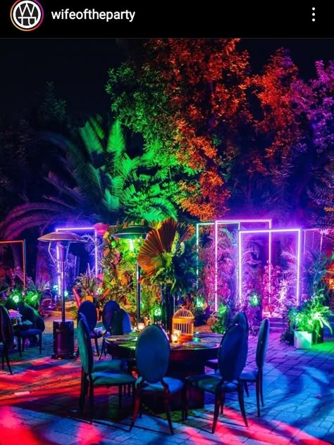 Neon Jungle Wedding Theme, Neon Jungle Aesthetic Party, Tropical Night Party Aesthetic, Jungle Rave Decor, Neon Jungle Theme Party, Neon Garden Party, Backyard Neon Party, Neon Party Decorations Outdoor, Jungle Nightclub