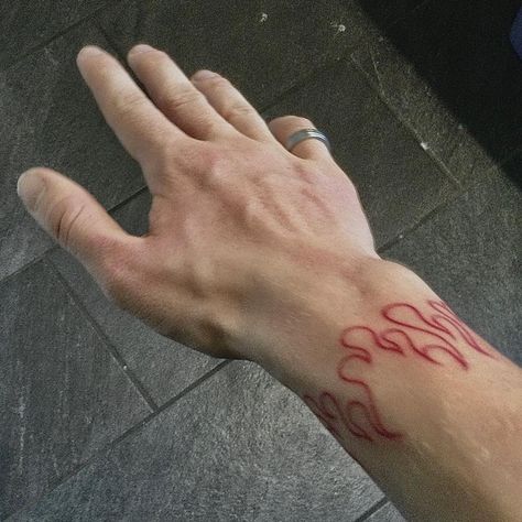 Red tattoo on wrist with a ring Red Tattoo Ideas, Flame Tattoo, Tato Jari, Red Tattoo, Flame Tattoos, Sick Tattoo, Fire Tattoo, Red Ink Tattoos, Tattoo Cover Up