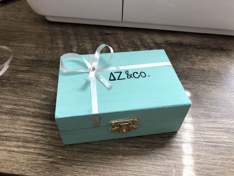 Sorority Box Reveal, Sisterhood Chair Ideas, Tiffany And Co Big Little Reveal, Pin Boxes Sorority, Sorority Canvas Paintings Delta Zeta, Badge Box Sorority, Sorority Pin Box Ideas, Pin Box Sorority, Sorority Pin Box