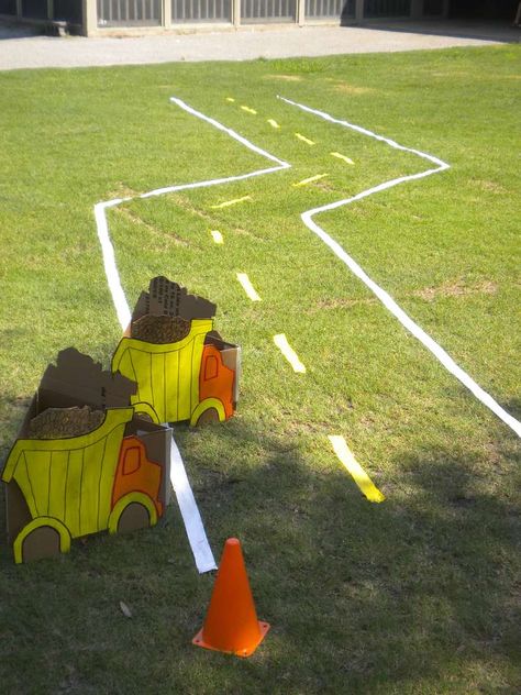 I like this idea, but in a circle. We could put out the trikes, trucks, and crazy coupe and they could go to town! Construction Vbs, Truck Birthday Party Ideas, Racing Decor, Dump Truck Birthday Party, Racing Party, Construction Theme Birthday Party, Dump Truck Birthday, Festa Hot Wheels, Construction Theme Party