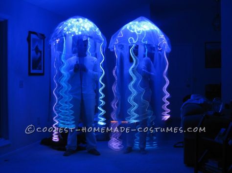 http://www.coolest-homemade-costumes.com/prizewinning-homemade-glowing-jellyfish-costumes/ Jellyfish Costumes, Umbrella Jellyfish, Jellyfish Halloween, Battery Powered Christmas Lights, Glowing Jellyfish, Diy Jellyfish, Jellyfish Costume, Fish Costume, Jellyfish Print