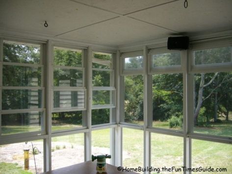 Four-track windows on a screened in porch let plenty of fresh air in. photo by Randy at TheFunTimesGuide.com 3 Season Porch Ideas, Porch To Sunroom, Eze Breeze Windows, Eze Breeze, Sunroom Windows, Screened In Porch Diy, Back Porch Designs, Glass Porch, Patio Windows