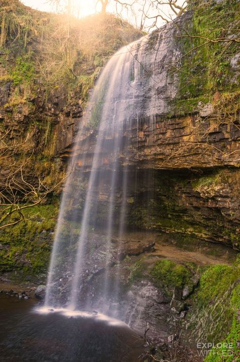 Henrhyd Falls- Used as the entrance to The Bat Cave in Dark Night Rises, the mysterious Henrhyd Falls is the highest in South Wales Wales Waterfalls, Visiting Wales, Dark Night Rises, Wales Holiday, Lake Swimming, Waterfall Wallpaper, Bat Cave, Wales Travel, Visit Wales