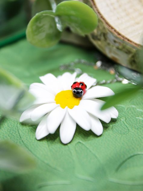 Handmade daisy necklace with a tiny ladybug 🐞 Made from polymer clay. Handmade in Norway. Kawaii. Ladybug Necklace, Daisy Necklace, Happy Art, Norway, Polymer Clay, Daisy, Figurines, Instagram Photos, Photo And Video