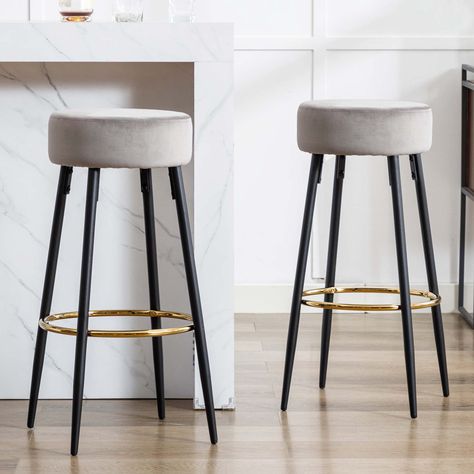 Minimalist design with clean lines, this round contemporary bar stool easily matches any other type of interior decor. Black metal legs match the golden footrest, with novel colour blending. Try adding these lovely bar stools to your kitchen, or restaurant to enjoy quick weekday breakfasts and delicious Sunday brunches. Seat Colour: Grey Round Bar Table And Stools, Small Breakfast Bar, Contemporary Bar Stool, Colour Blending, Breakfast Bar Stools, Contemporary Bar Stools, Contemporary Bar, Blue Elephant, Metal Bar Stools