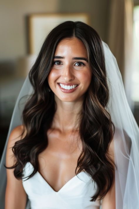 Explore 70+ bridal hair down inspirations for every season. These hairstyles are perfect for brides wanting to wear their hair down on their wedding day. From romantic curls to sleek straight hair, find the perfect bridal hair down look for any season. Simple Wave Hairstyles, Bridesmaid Hair For Beach Wedding, Bridal All Down Hairstyles, Simple Wavy Wedding Hair, Bridal Hair Straight Long, Bridal Hair Medium Length Waves, Classic Elegant Wedding Hair, Down Wedding Hairstyles Medium Length, Bridal Hairstyles Long Hair Down