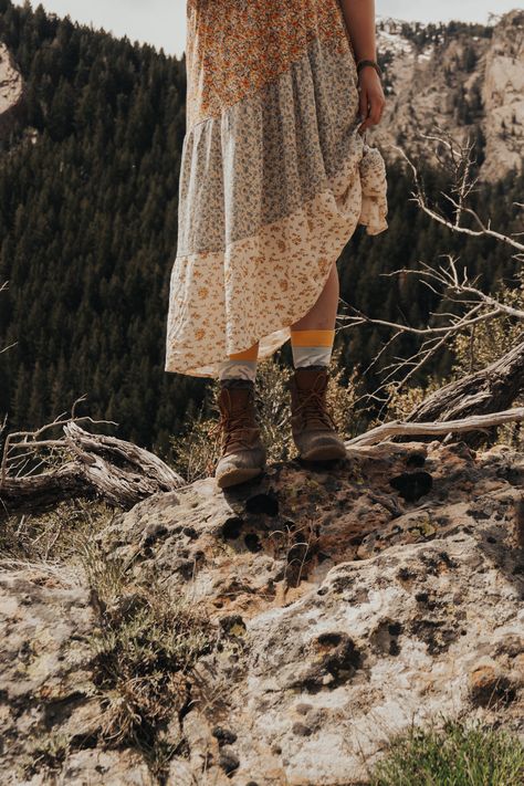 Floral maxi skirt with hiking boots. Hiking photography. Adventure outfits women. Hiking Boots And Dress Outfit, Hiking Boot With Skirt, Hiking Boots With Skirt, Skirt Hiking Outfit, Hiking Boots Dress Outfit, Dress With Hiking Boots Outfit, Camping Skirt Outfits, Hiking Boots With Dress, Girly Hiking Outfit