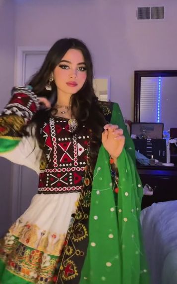 Afghan girl in afghan dress Afghan Outfit, Gand Afghani, Afghani Culture, Breakup Messages, Cultural Clothes, Gown Dress Party Wear, Afghanistan Culture, Afghan Culture, Henry Danger Jace Norman