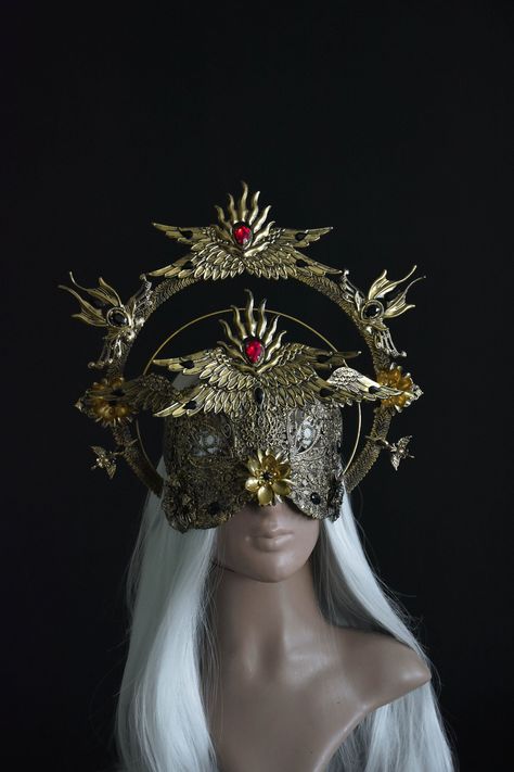 Set of Two Piece Ikaros Halo Crown and Blind Mask. In the mask you can see through the ornaments and move around safely. This set is adorned with exquisite ornaments that evoke the ethereal imagery of wings and sunbeams, woven seamlessly into its design. At its zenith, the crown boasts a triumphant centerpiece of wings unfurled, each feather meticulously etched and defined, capturing the essence of flight and freedom.  The set is available in different colors (see last photo). The crown and blin Angel Face Mask, Deer Mask Masquerade, Eye Covering Mask, Half Face Mask Design, Halo Design Angel, Cool Mask Designs, Winged Headpiece, Half Mask Design, Sun Halo Crown