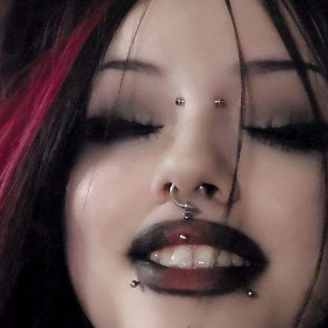 gothgirl gothmakeup gothic mallgoth red black piercings Goth Lip Piercing, Alt Face Peircings, Goth Percinings, Full Face Of Piercings, Face Piercings Aesthetic Grunge, Grunge Piercings Face, Piercings Aesthetic Face, Edgy Makeup Grunge, Facial Piercings Aesthetic